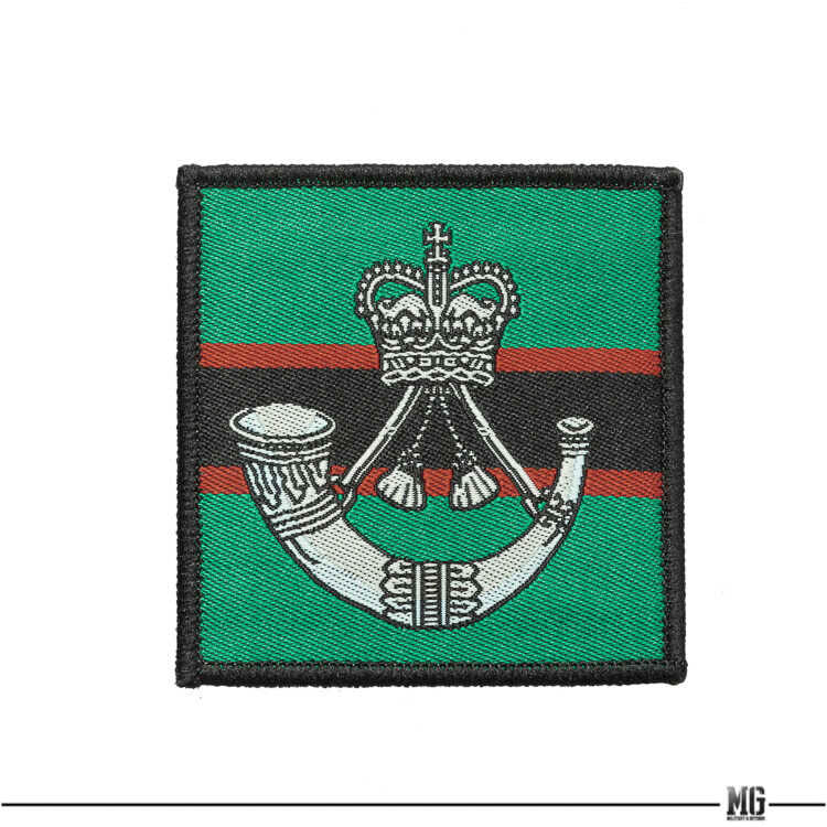 Embroidered unit ID patch with teal panel, red stripe, crest emblem, black border